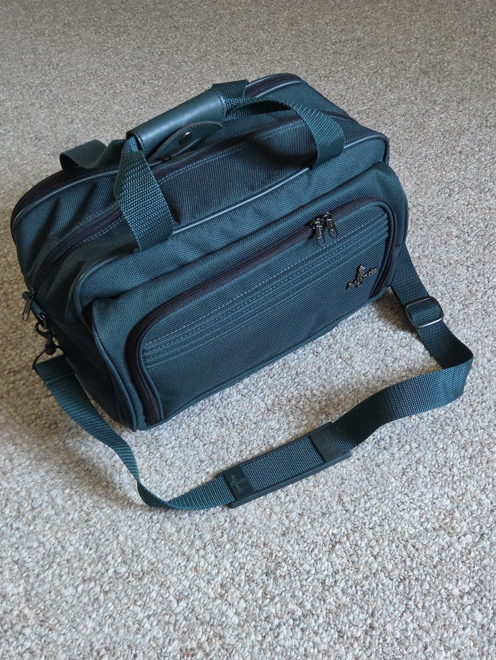 Atlantic Green Travel Duffel with Adjustable Shoulder Strap.